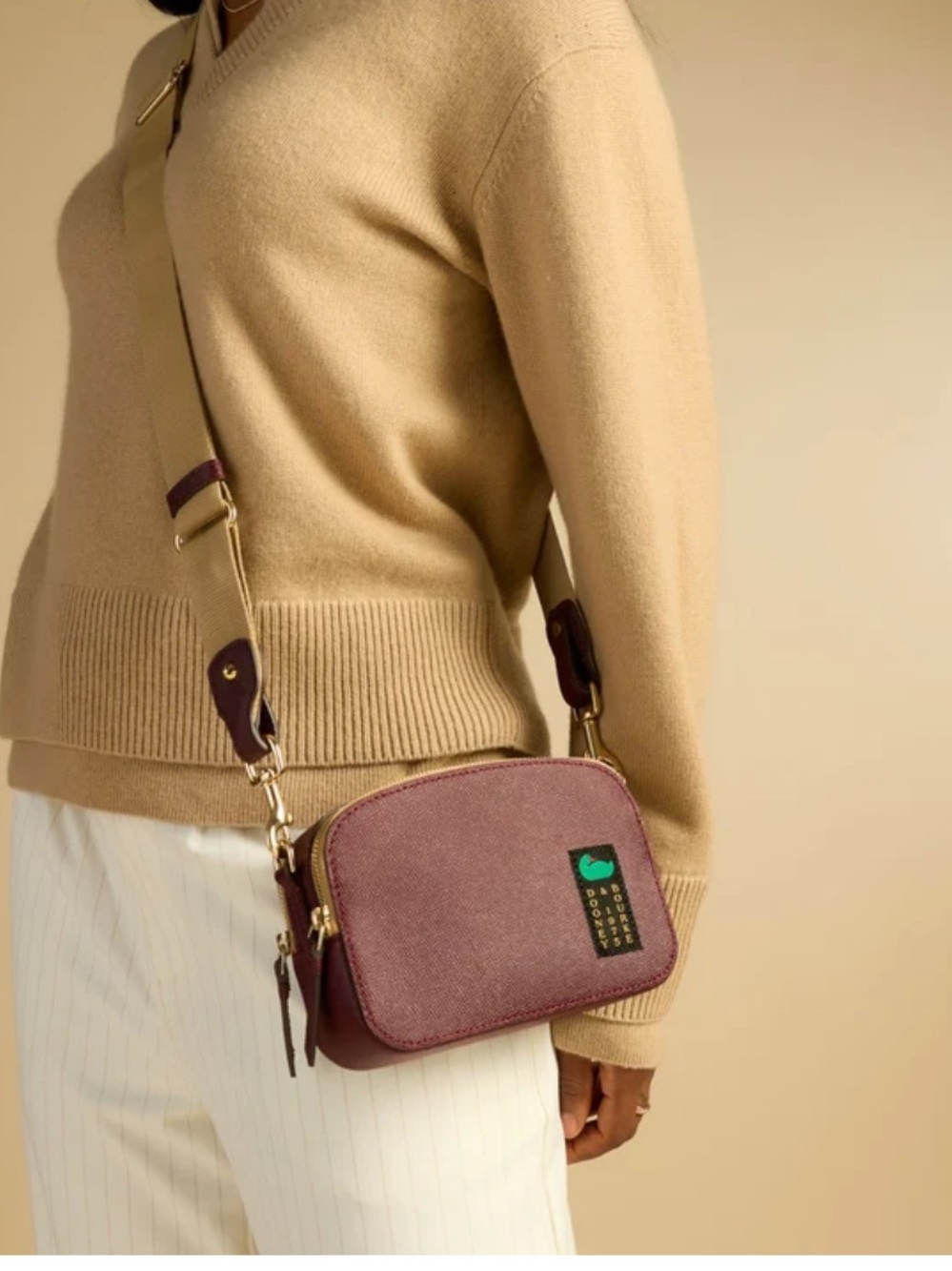 Dooney & Bourke Alpine 20 Plum Crossbody Bag with Adjustable Strap
